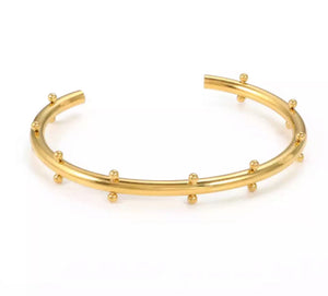 PULSERA CUFF DORADA